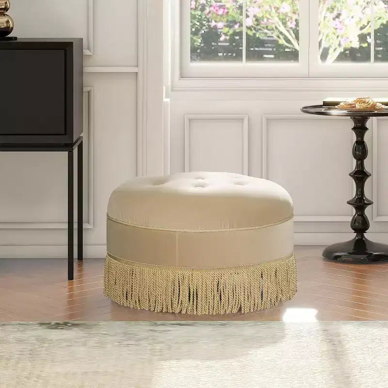 Ottoman rond d'appoint capitonné