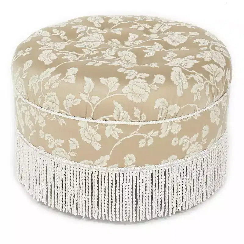 Ottoman rond d'appoint capitonné